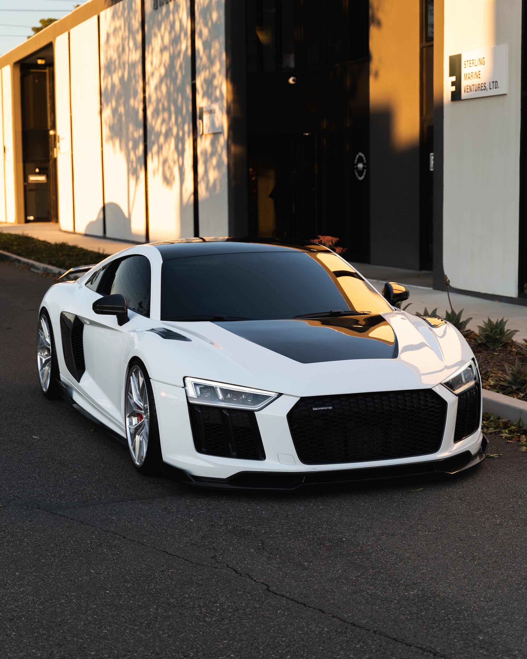 Luxury sports car protected with clear gloss paint protection film