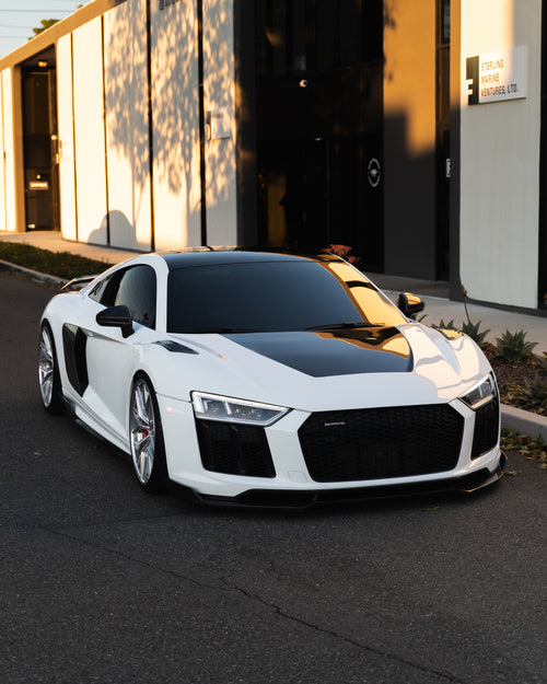 Luxury sports car protected with clear gloss paint protection film